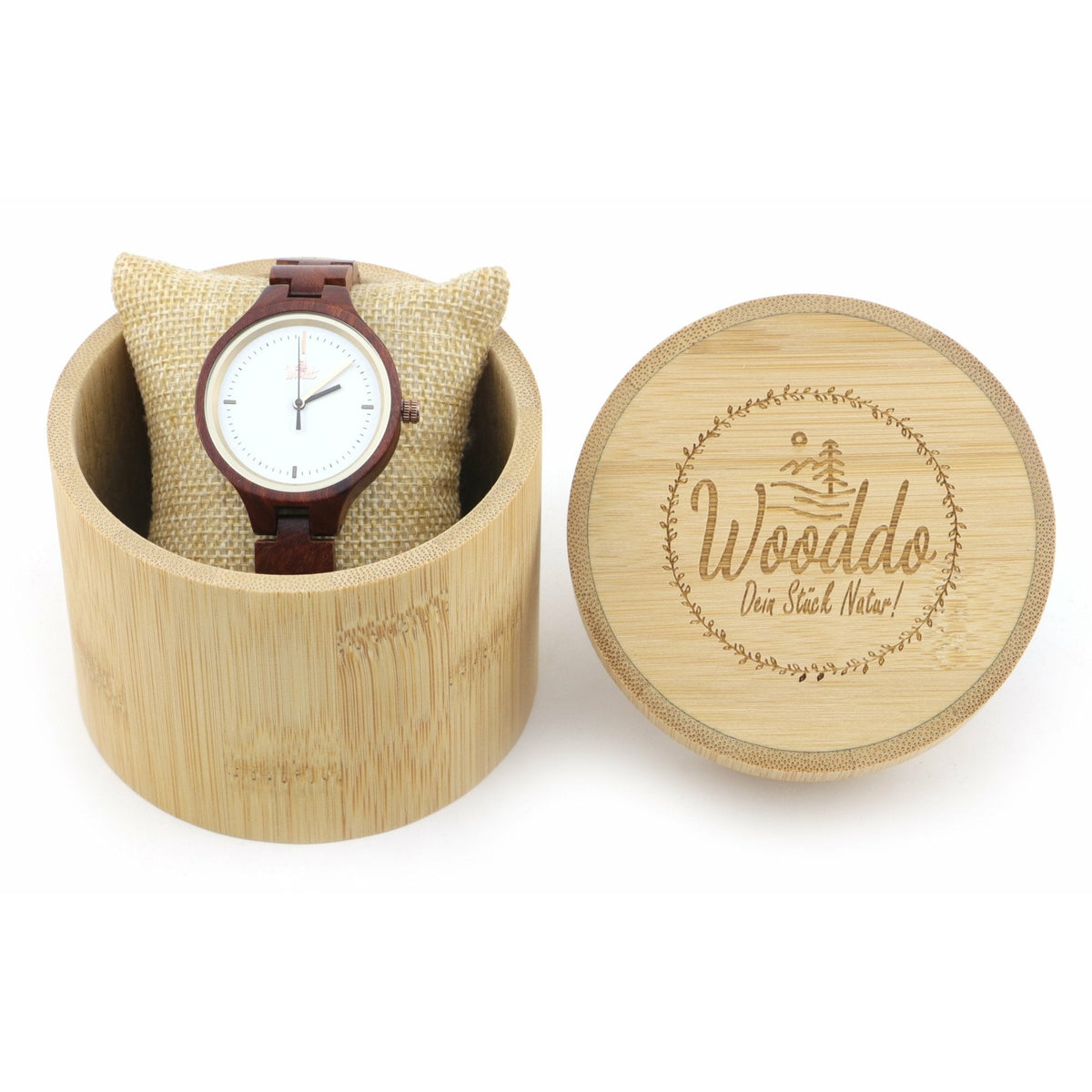 Holzuhr Redwonder in der geöffneten runden Wooddo-Holzverpackung