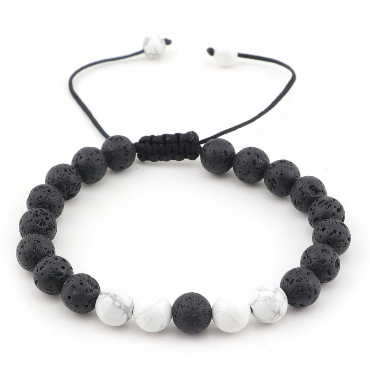 Armband White Dot aus schwarzen Lavaperlen und weißen Marmorperlen mit verstellbarem Band