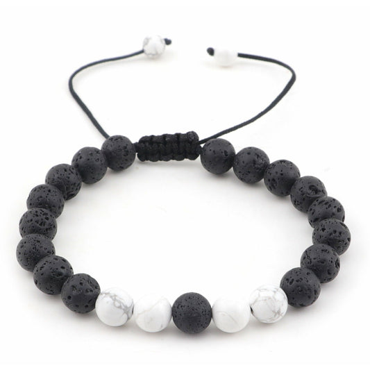 Armband White Dot aus schwarzen Lavaperlen und weißen Marmorperlen mit verstellbarem Band